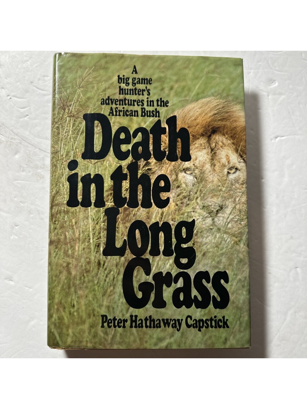 Death in the Long Grass Peter Hathaway Capstick Hardcover Dust Jacket